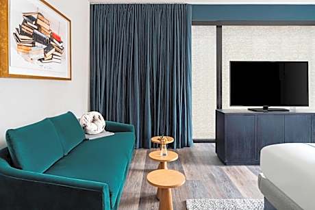 Corner Guest Room with King Bed and University View