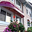 Magnuson Grand Pioneer Inn And Suites