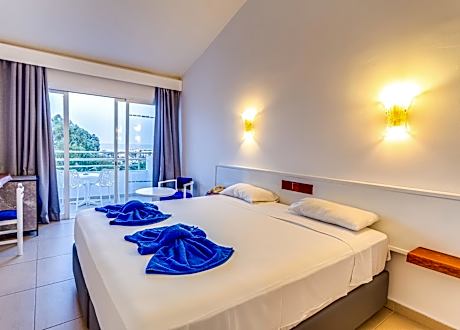 Triple Room with Side Sea View (2 adults + 1 child)