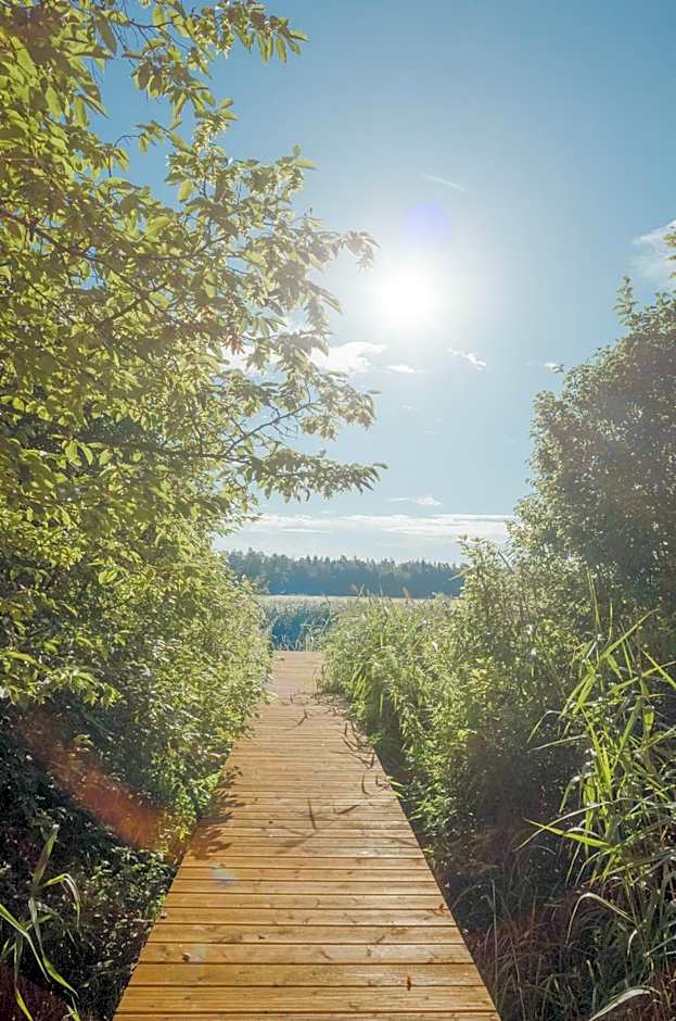 Pustelnia Supraśl - domki nad rzeką