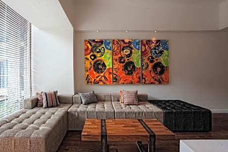 TSand Suite with All Day Breakfast, Daily Restocked Mini-bar and other Free Benefits