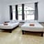 "Spacious Suite with 4 Bedrooms and Amenities"