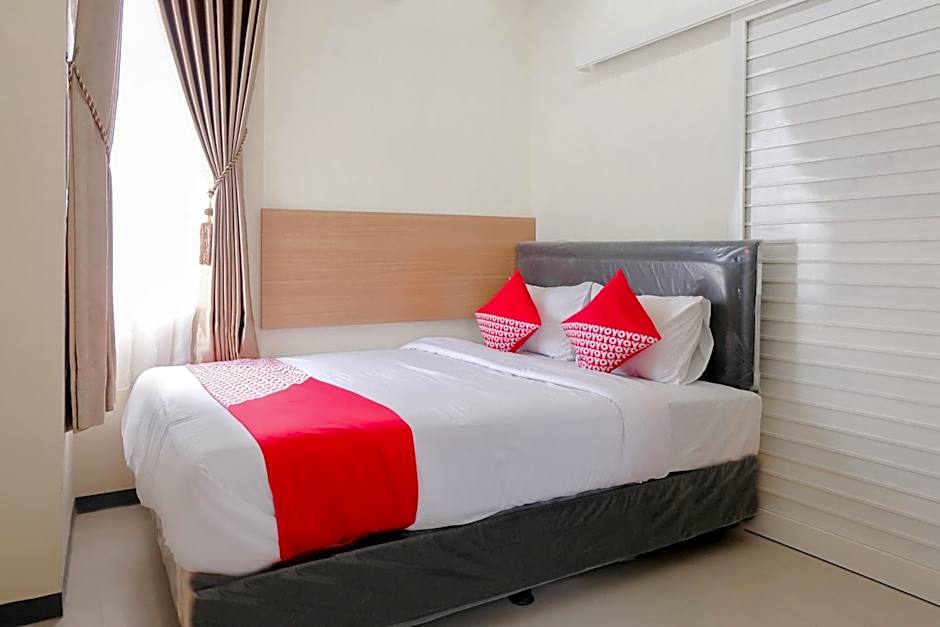 OYO Flagship 1603 Antosa Family Residence Silver Key