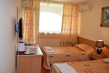 Economy Double Room with Balcony (2 Adults + 1 Child)