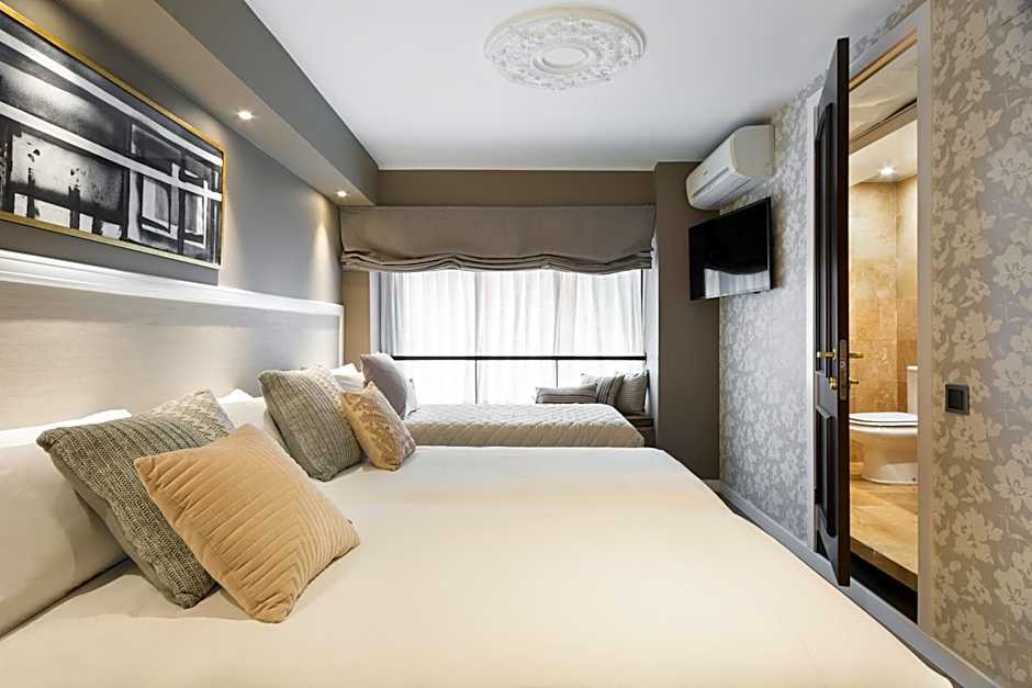 Photo 1 of 12 of Triple Room