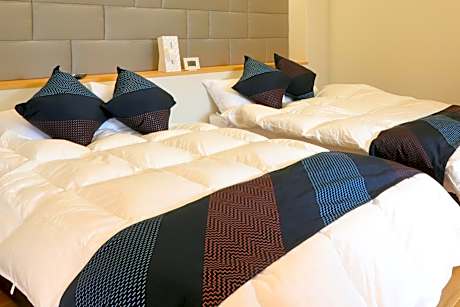 Quadruple Room with Private Bathroom