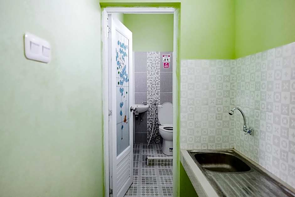 RedDoorz Syariah Near SMA N 6 Palembang