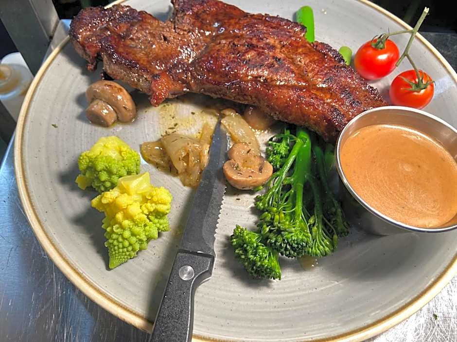 The Copper Still Bar Restaurant & Boutique Rooms