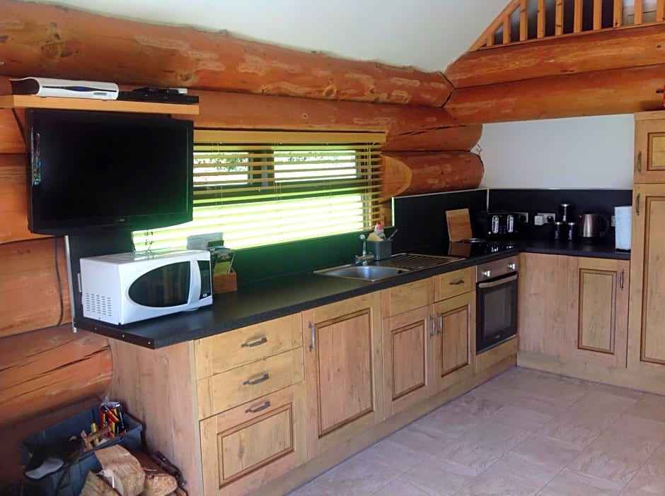 lyne view, log cabin