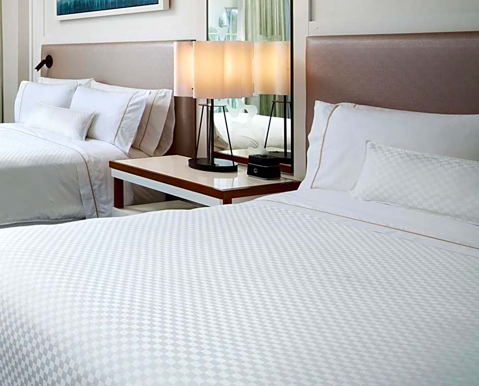 Photo 1 of 5 of Ocean 2 Double Beds with Sofabed Guestroom, Pool View