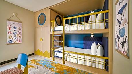 Two-Bedroom Suite with One King Bed, One Bunk Bed and Ocean View