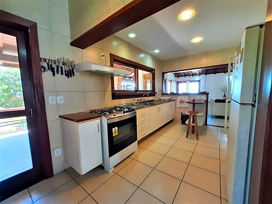 3Suítes, piscina e vista do mar em condomínio pé na areia - pátio compartilhado