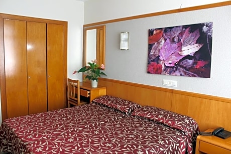 Twin Room with Balcony (2 Adults + 2 Children) 