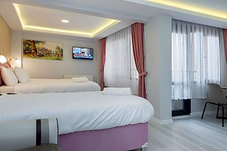 Deluxe Quadruple Suite Balcony.