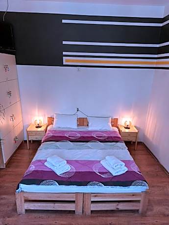 Economy Quadruple Room with Shared Bathroom