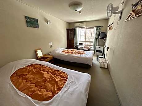 Double or Twin Room with Shared Bathroom