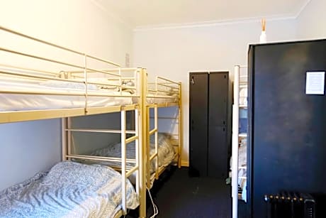 Bed in 6-Bed Female Dormitory Room with Shared Bathroom