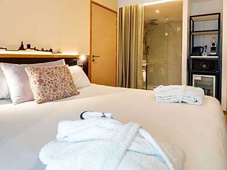 Double Suite with Balcony and One Double Sofa Bed