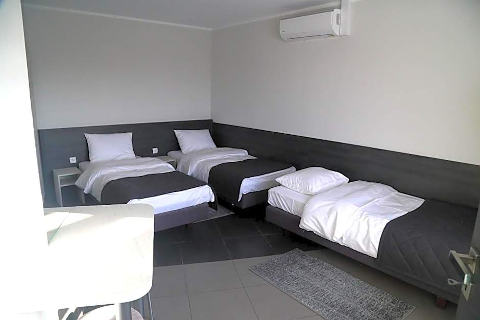 Photo 1 of 6 of Triple Room with Private Bathroom