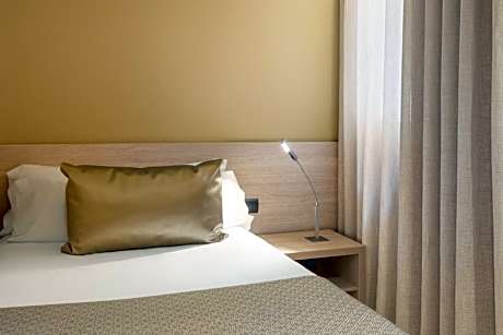 Triple Room (2 Adults + 1 Child)