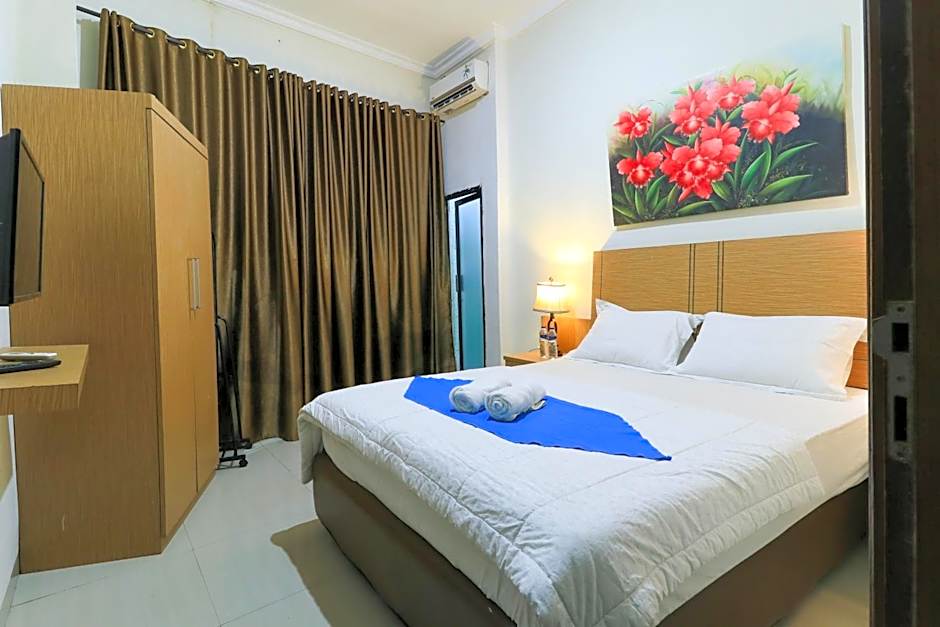 Labuana Homestay & Cafe Garden