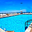 Oceanfront Escape With Balcony and heated salt water pool Sleeps 4