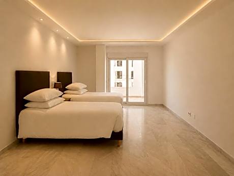 Deluxe Three-Bedroom Apartment with City View