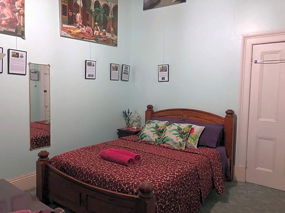 Photo 1 of 4 of Queen Room with Shared Bathroom