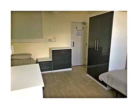 Single Bed in Female Dormitory Room