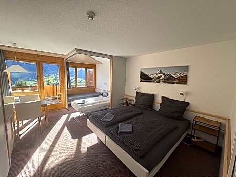 High Floor Quadruple Room with Balcony