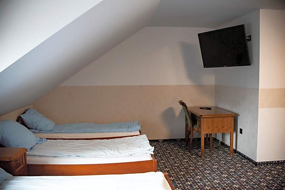 Photo 1 of 5 of Triple Room with Private Bathroom
