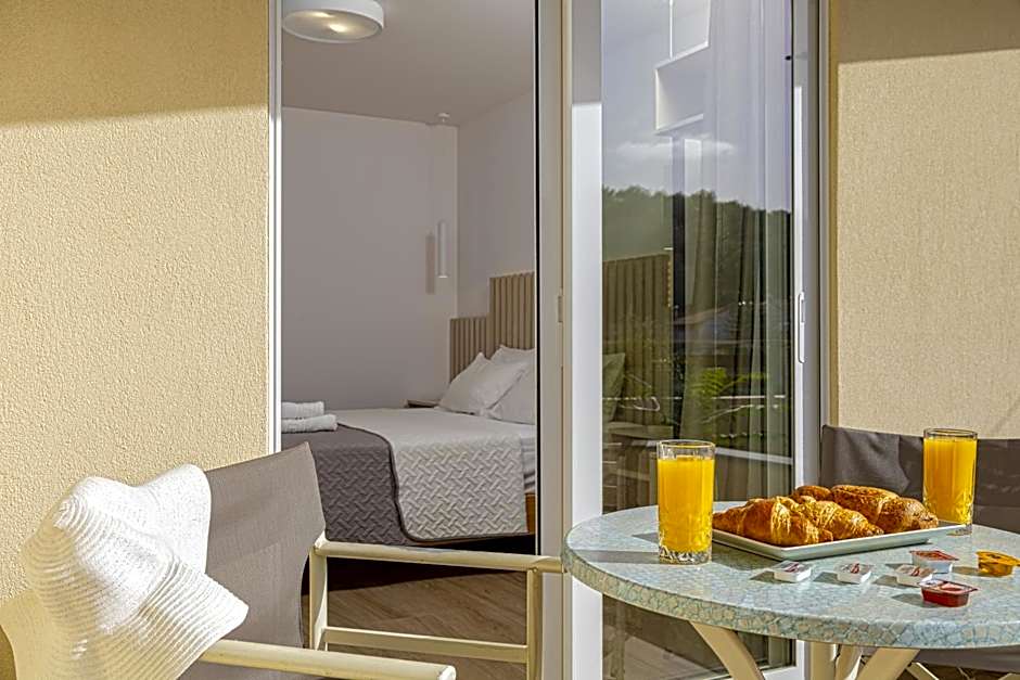 Theos Village Apartments