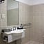 Carlyle Suites & Apartments