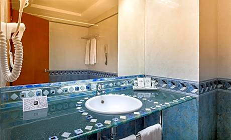 Quadruple Room with Terrace (3 Adults + 1 Child)
