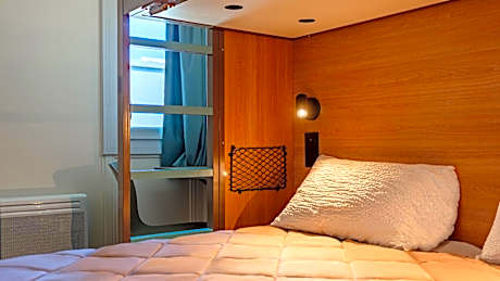 Standard Queen Room with One Queen Bed and One Bunk Bed