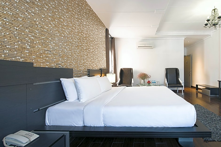 A & Em Corp - The Petit Hotel