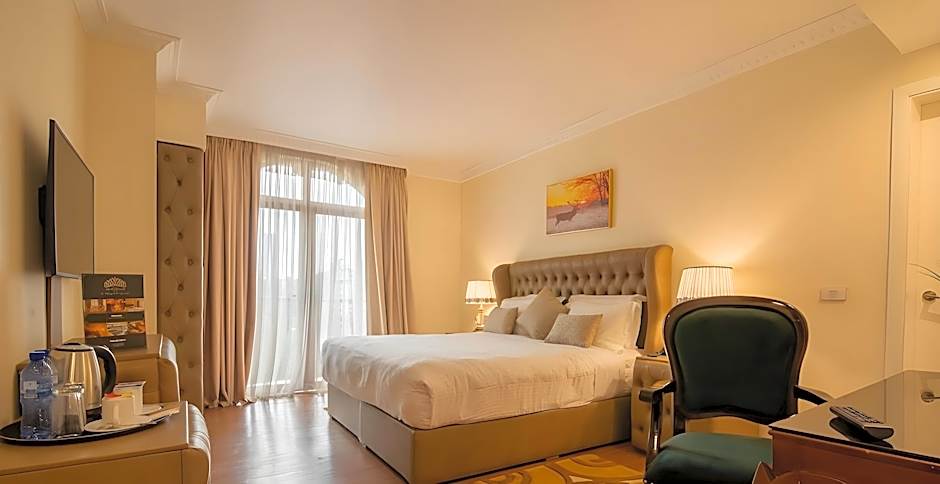 Suites at The Grand Palace Hotel