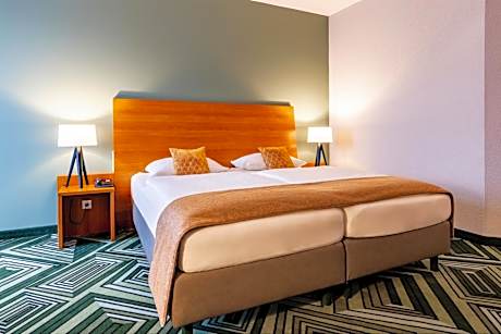 Deluxe Twin Room with Sofa Bed and Balcony