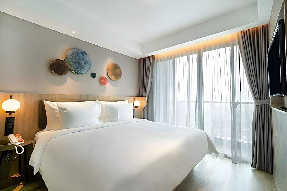 HARRIS Suites Puri Mansion