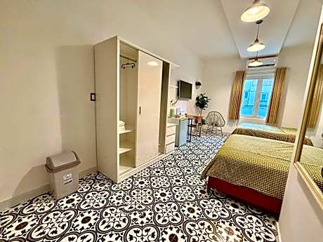 Quadruple Room with Private Bathroom