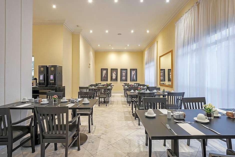 ROCKEFELLER by Slaviero Hotéis