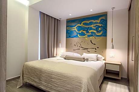 One-Bedroom Suite with Balcony and Sea View