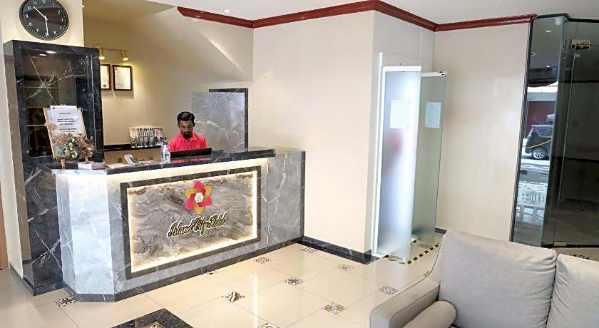 Capital O 90897 Island City Hotel