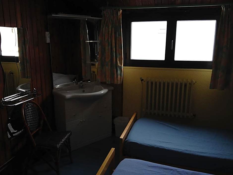 Photo 1 of 4 of Economy Twin Room with Shared Bathroom