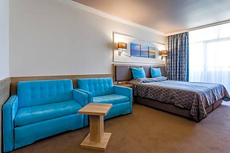 Superior Twin Room with Balcony and Street View (3 Adults + 1 Children)