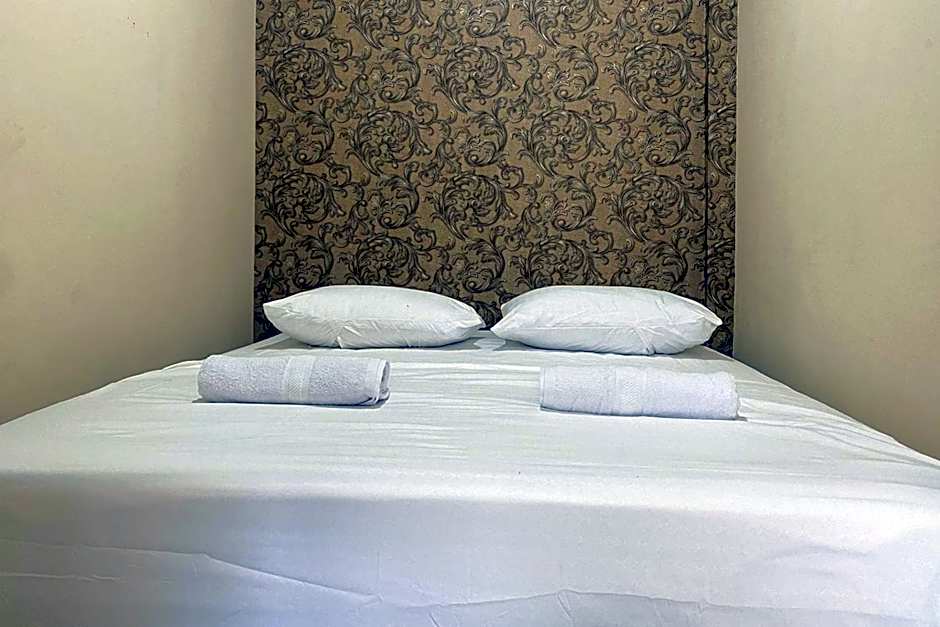 CK Homestay Syariah near Lippo Plaza Jambi Mitra RedDoorz