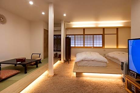 Quadruple Room with Private Bathroom