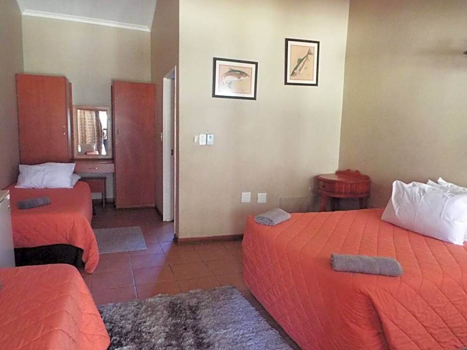 Photo 1 of 4 of Quadruple Room