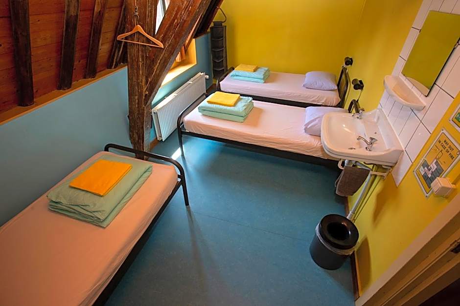 Photo 1 of 6 of Basic Triple Room with Shared Bathroom
