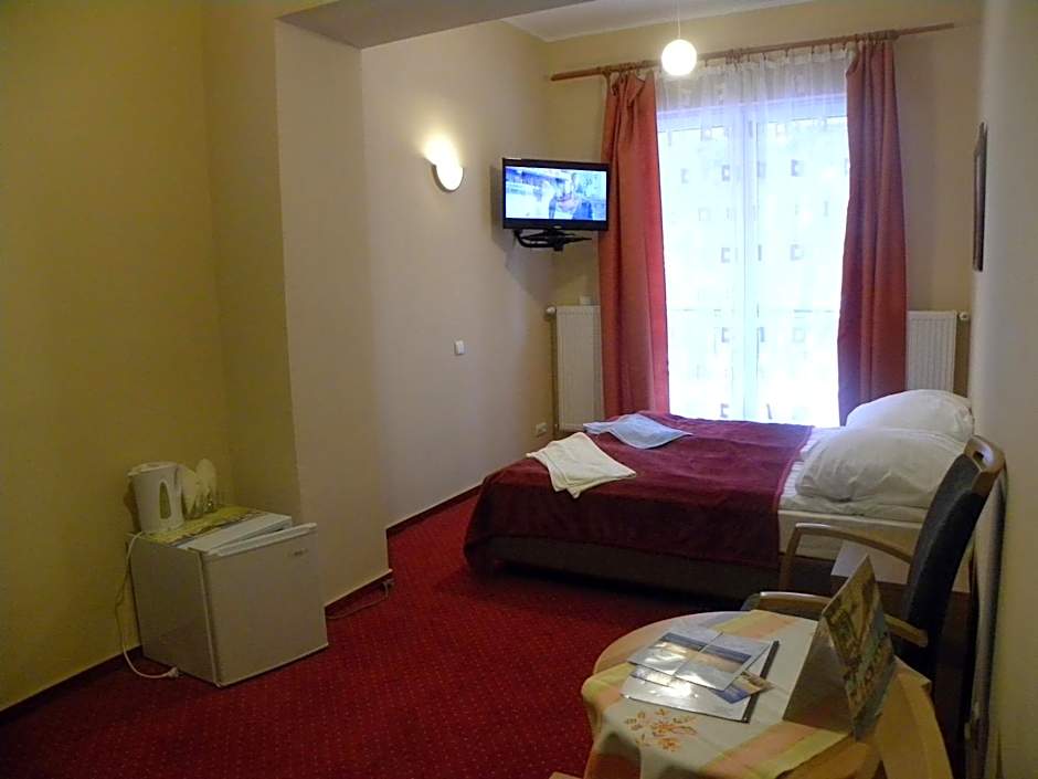 Okulski Grand Rozewie Pokoje i Apartamenty